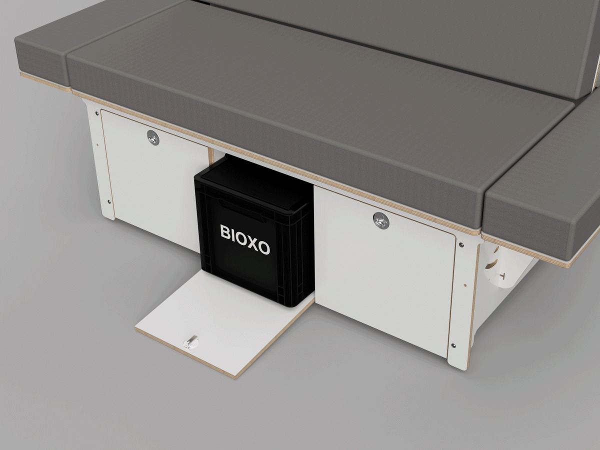 A modern camping bed system with a practical storage space and a pull-out box for accessories.